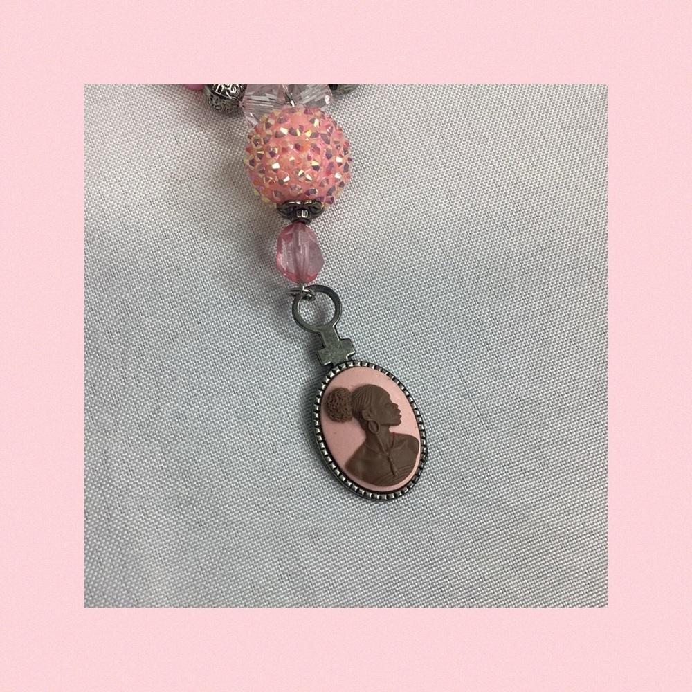 Pink and sliver beaded necklace.